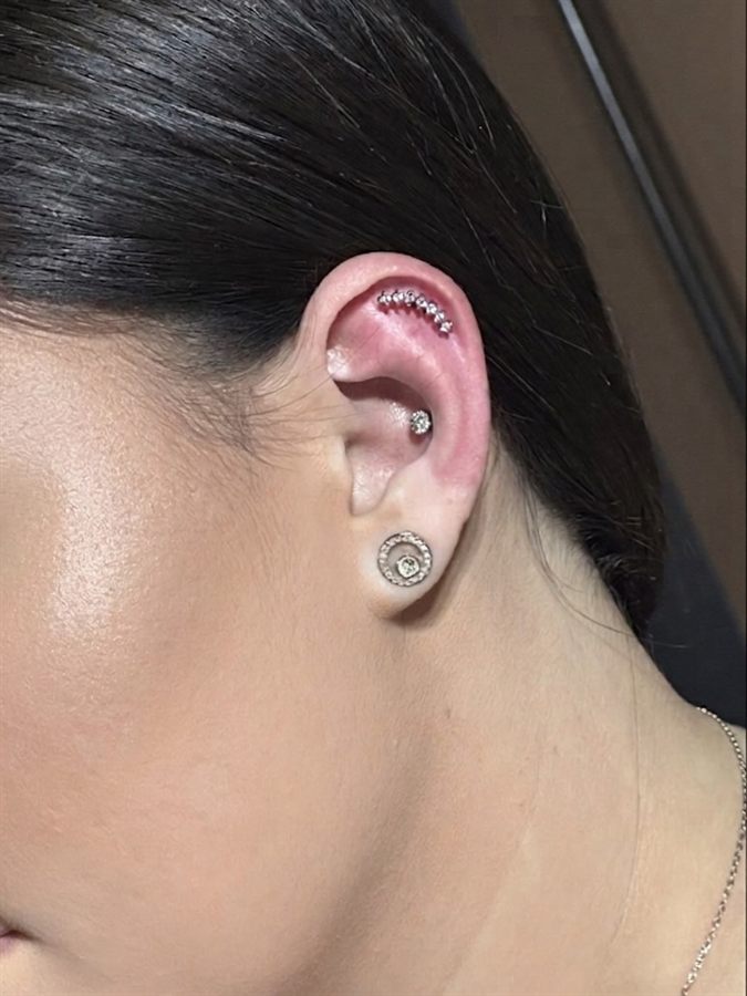 Piercing pe lobul urechii